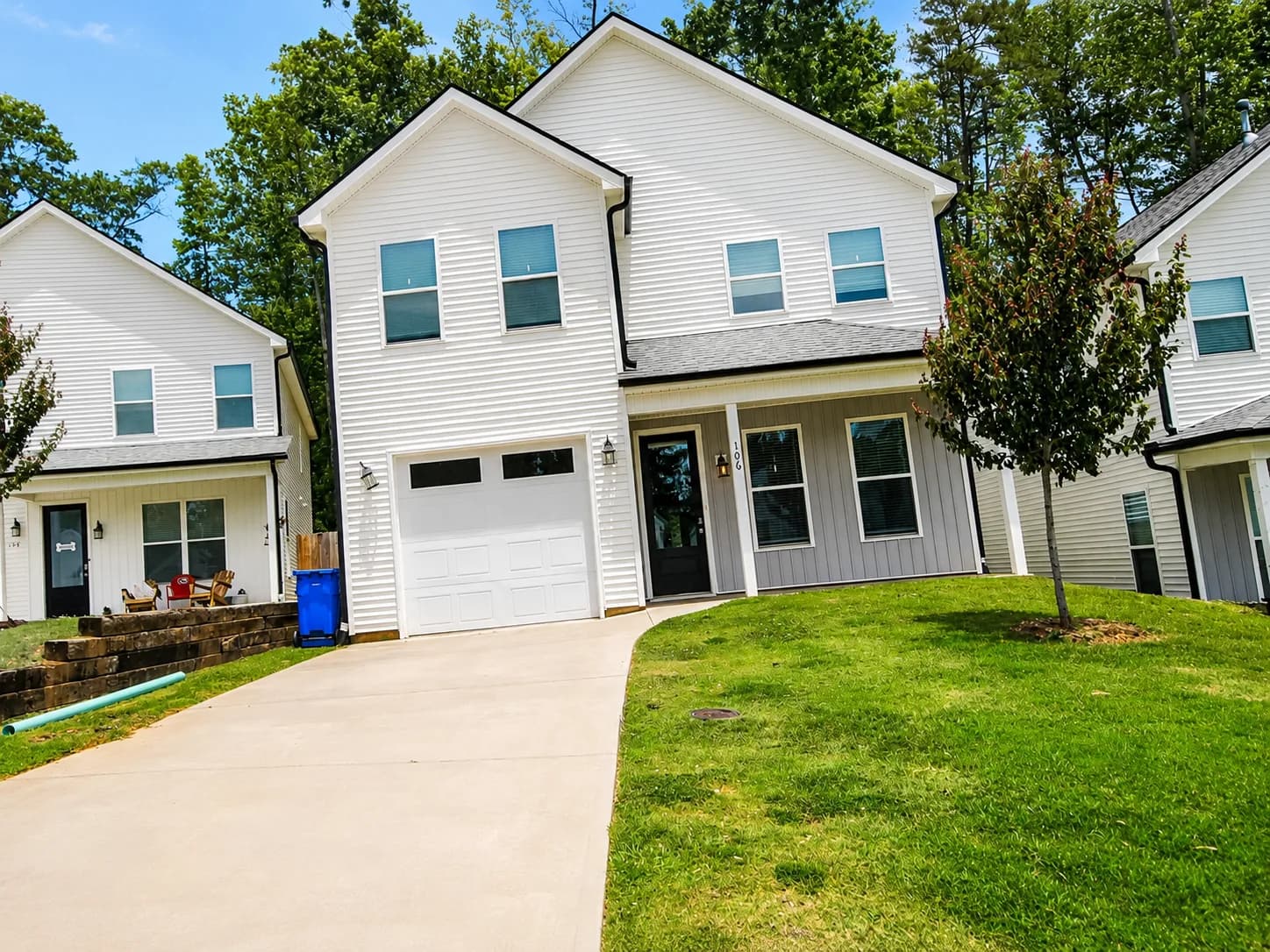 Exterior of the Edgewood, a two story home with an attached garage and covered front porch in Travelers Rest, SC