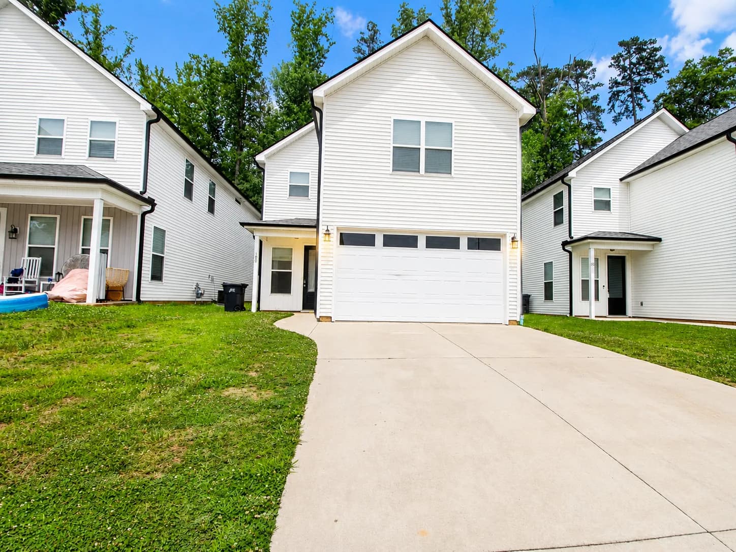 Exterior of the Heritage, a two story home with an attached garage and covered front porch in Travelers Rest, SC