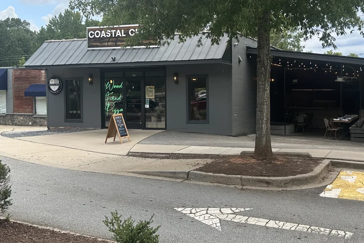 Coastal Crust wood fired pizza restaurant with a covered patio in downtown Travelers Rest, South Carolina