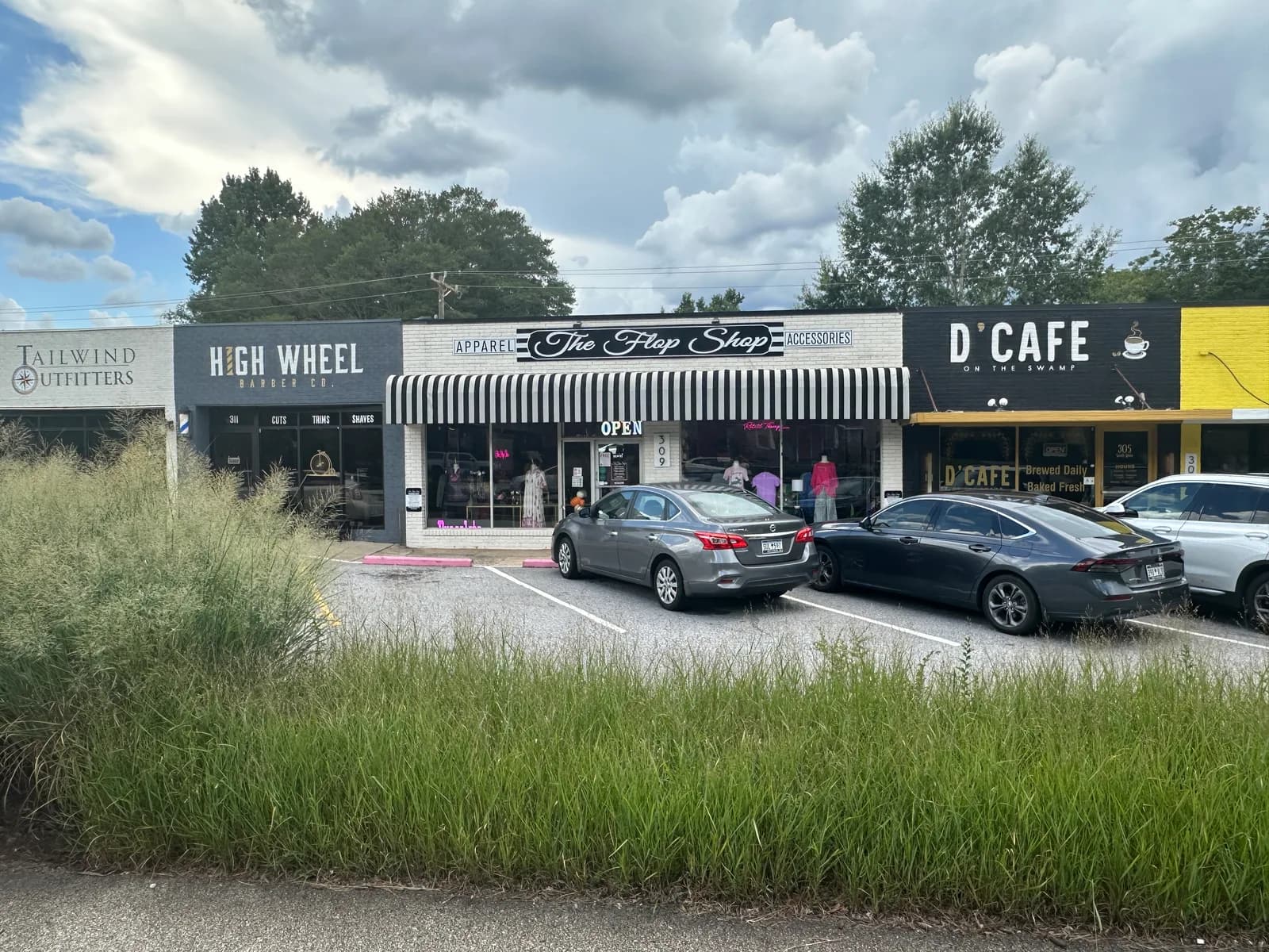 Storefronts including High Wheel, The Flop Shop and D'Cafe along Main Street in Travelers Rest, South Carolina