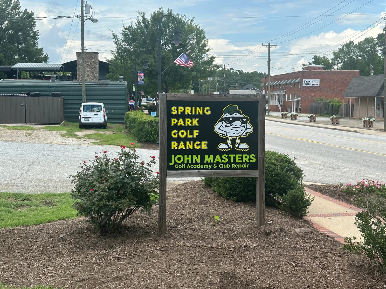 The Spring Park Golf Range and John Masters Golf Academy sign beside the road in Travelers Rest, South Carolina