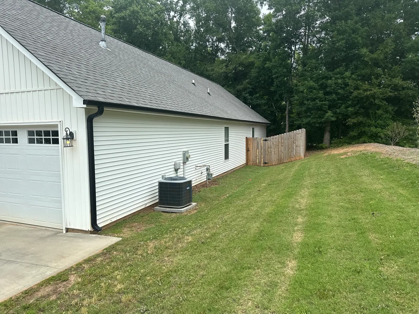 Private driveway and attached garage at 2 Solis Court