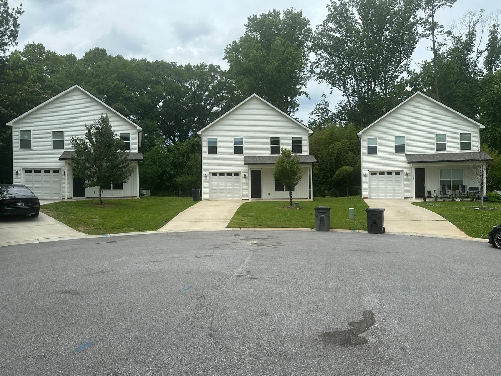 Matching homes with garages around a cul-de-sac in the Travelers Rest community